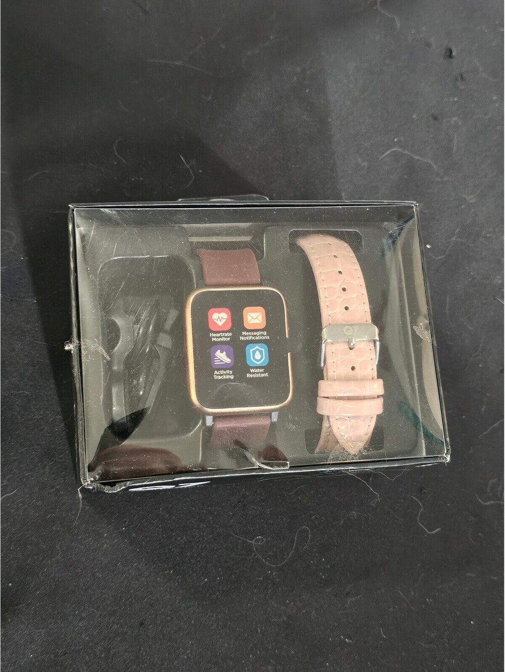 Q7 Smartwatch with Extra Pink Band and Charging Cable - Water Resistant IP67